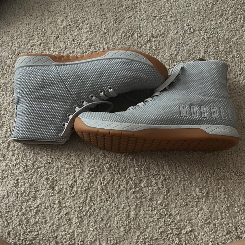 Grey gym shoes.